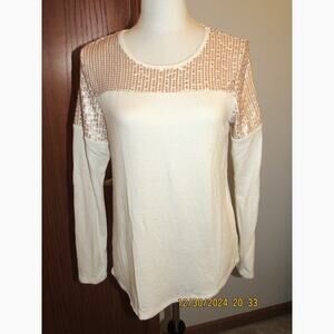 Maurices gold shimmer sweater — perfect for adding sparkle to any outfit.